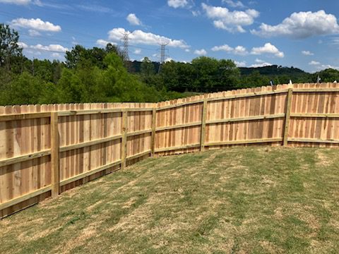 Cedar wood stockade fence installation in Chattanooga, TN