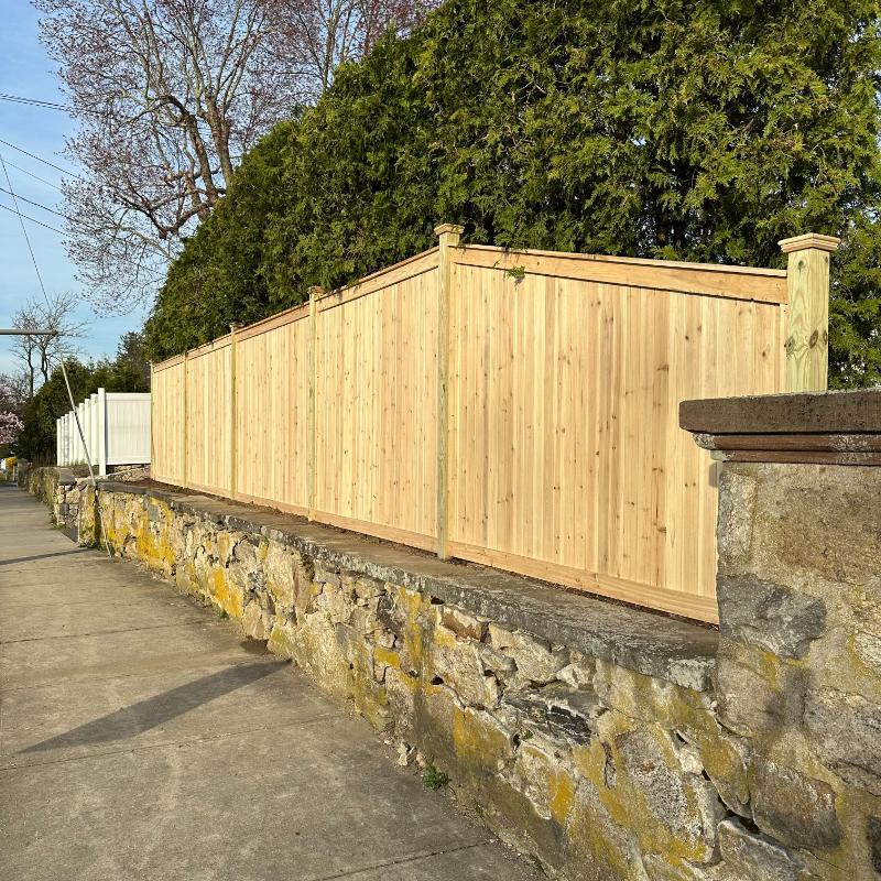 wood fence stockade with cap and trim