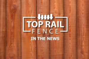 Top Rail Fence In the News Logo overlayed on a fence
